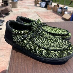 Men’s black and yellow Hey Dude’s